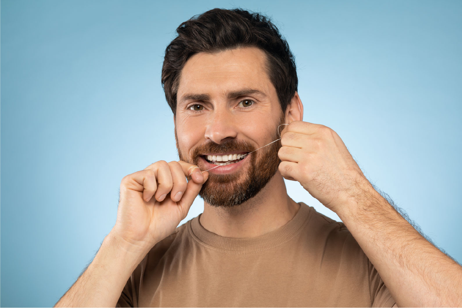 Prevención de enfermedad periodontal con hilo dental en Cajicá
